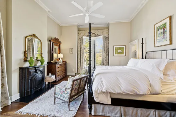 an aerial view of a house with a garden and trees