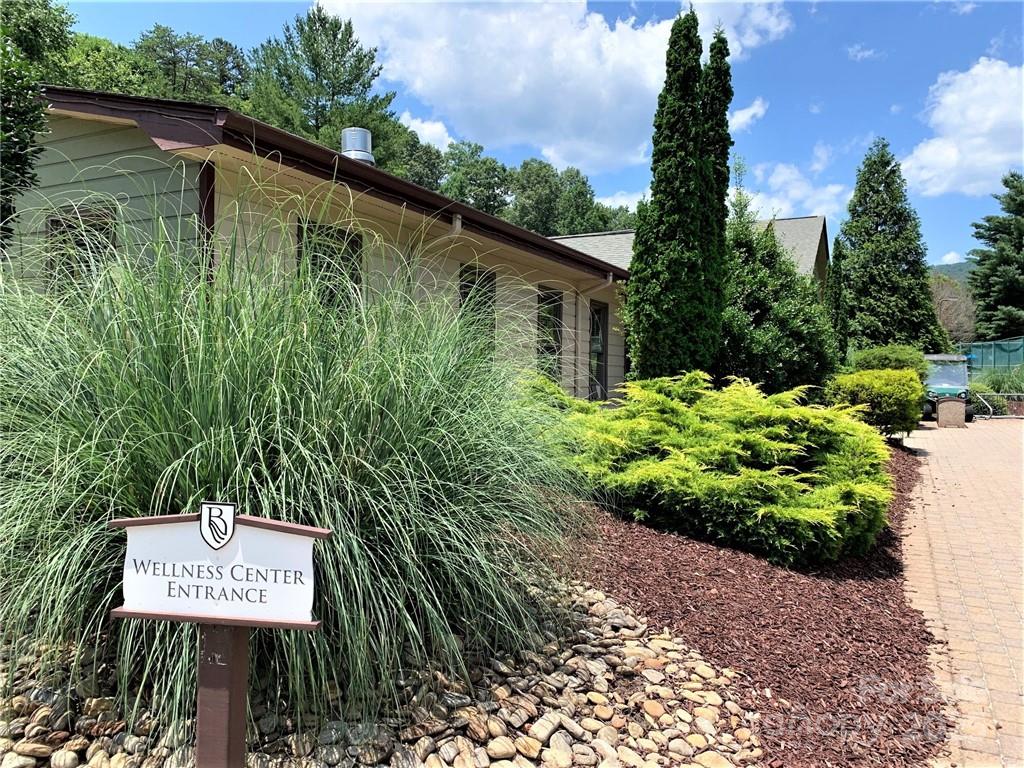 31 High Rock Ridge, Unit 31 Lake Lure, NC 28746 - Photo 21 of 41 a sign on the side of a building