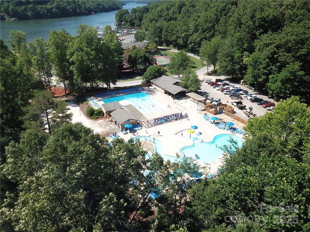 31 High Rock Ridge, Unit 31 Lake Lure, NC 28746 - Photo 27 of 41 a view of backyard with plants and outdoor seating
