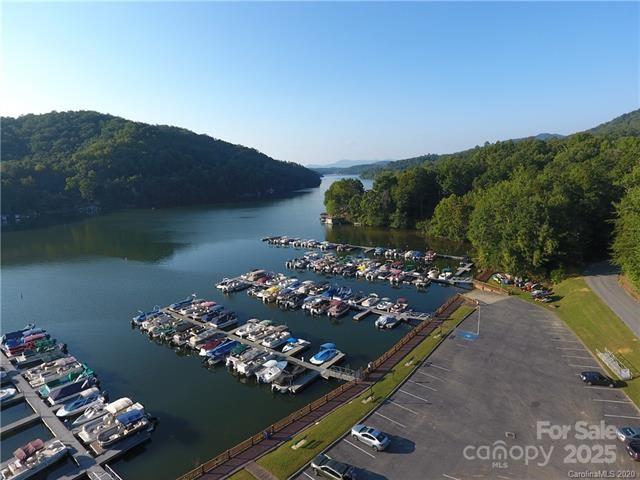 31 High Rock Ridge, Unit 31 Lake Lure, NC 28746 - Photo 28 of 41 a view of a balcony with chairs and a table