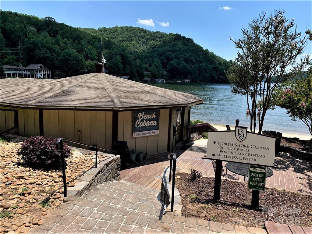 31 High Rock Ridge, Unit 31 Lake Lure, NC 28746 - Photo 32 of 41 a view of a dinning table and chairs on the roof deck
