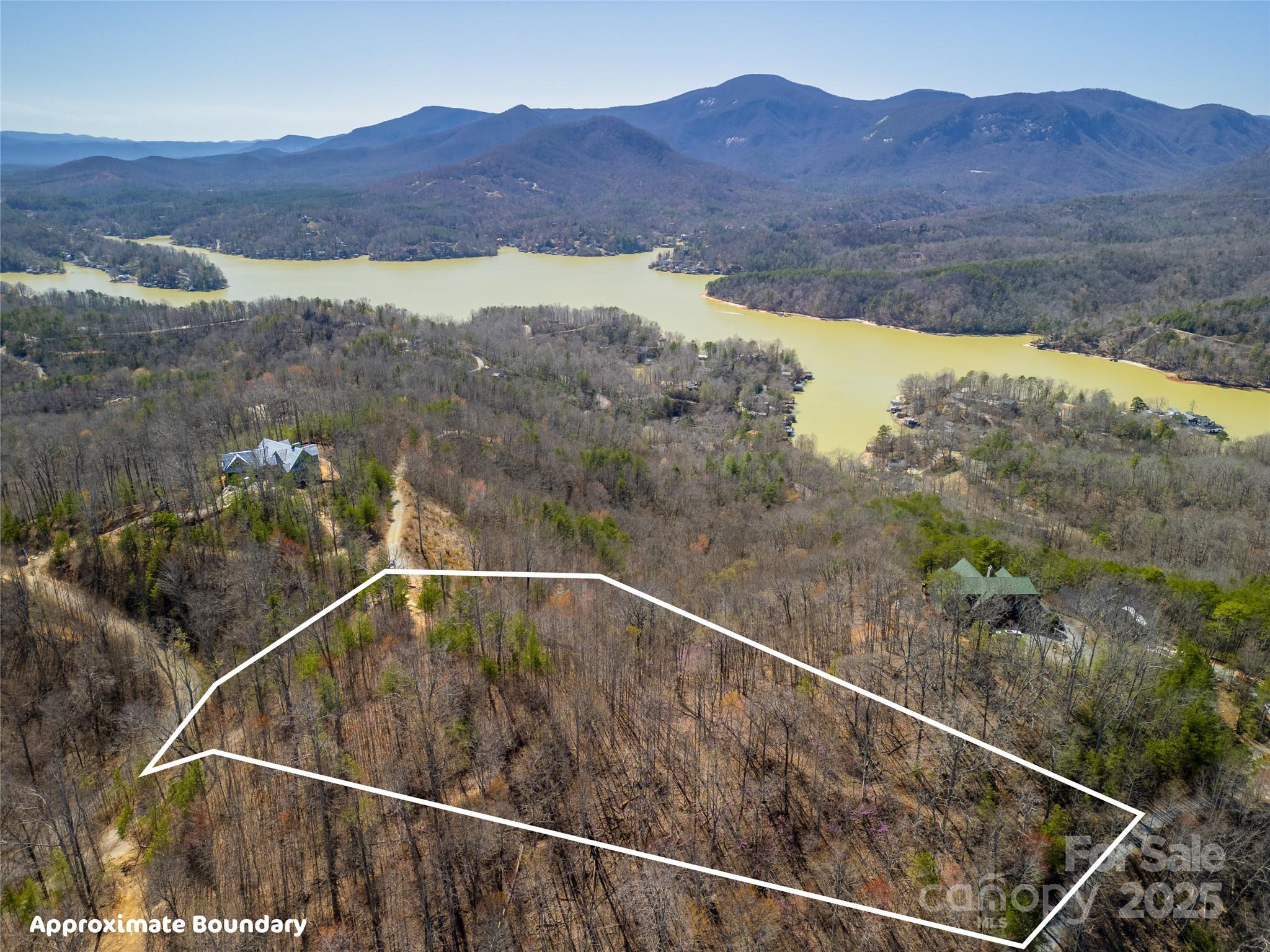 31 High Rock Ridge, Unit 31 Lake Lure, NC 28746 - Photo 8 of 41 a view of a mountain from a balcony