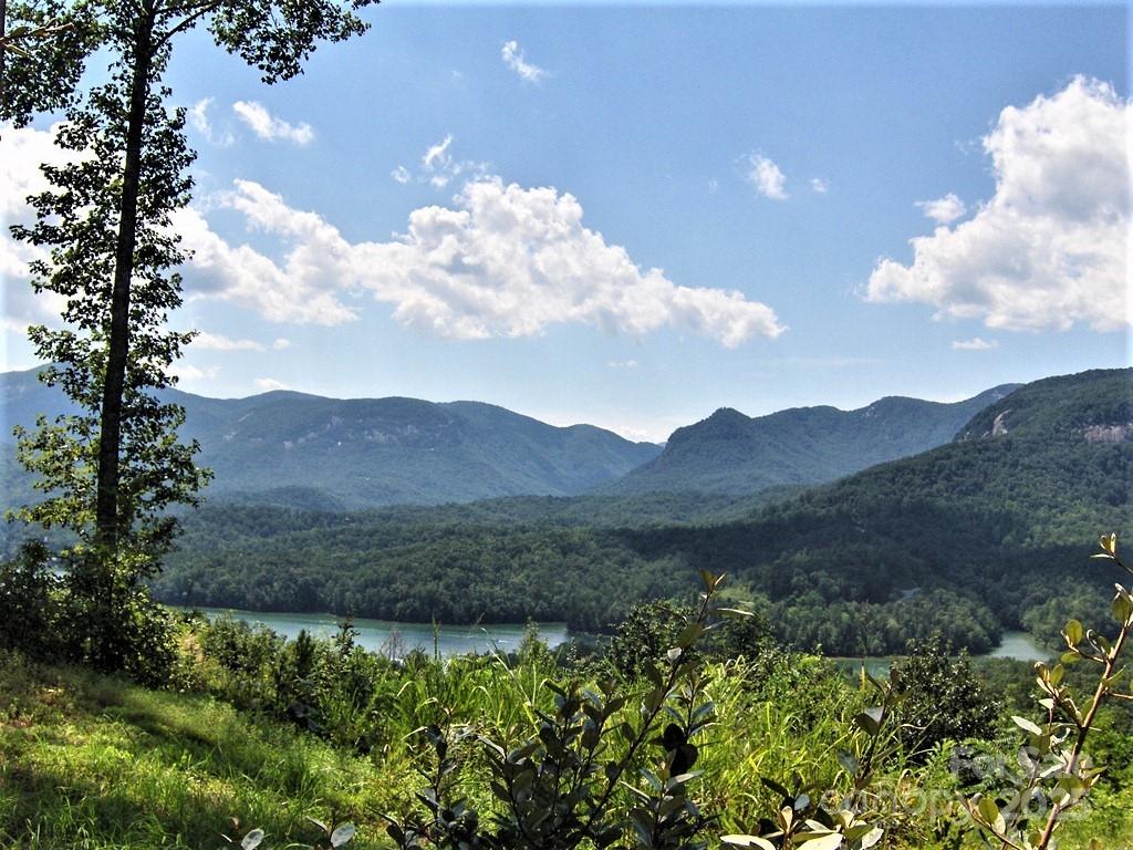 31 High Rock Ridge, Unit 31 Lake Lure, NC 28746 - Photo 10 of 41 a view of a house with a mountain in the background