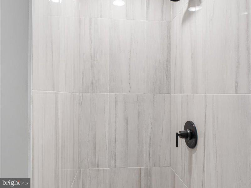 1645 Normal Avenue Baltimore, MD 21213 - Photo 24 of 53 a close view of shower tap