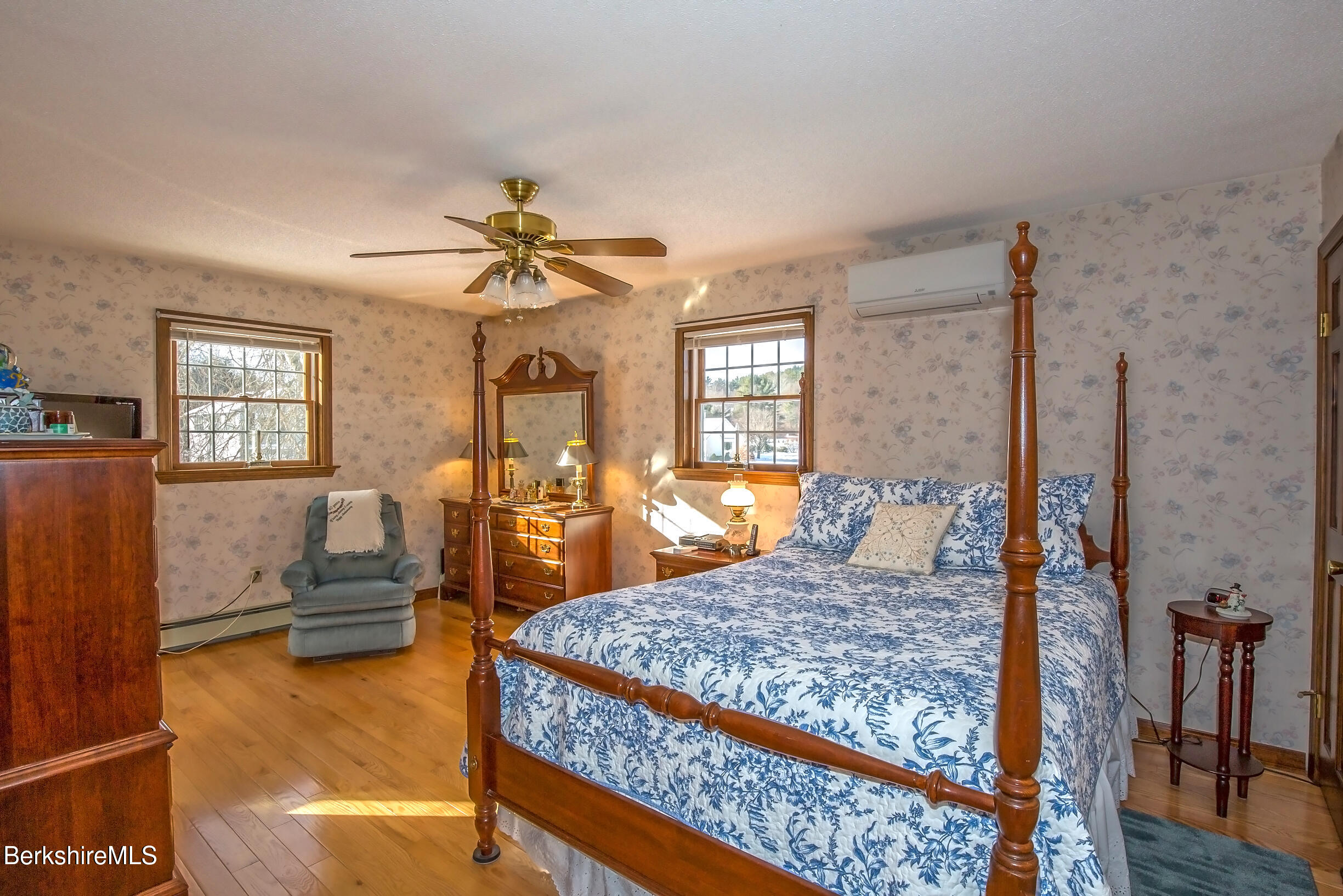 71 King William Road Lenox, MA 01240 - Photo 19 of 43 a bed sitting in a room next to a window