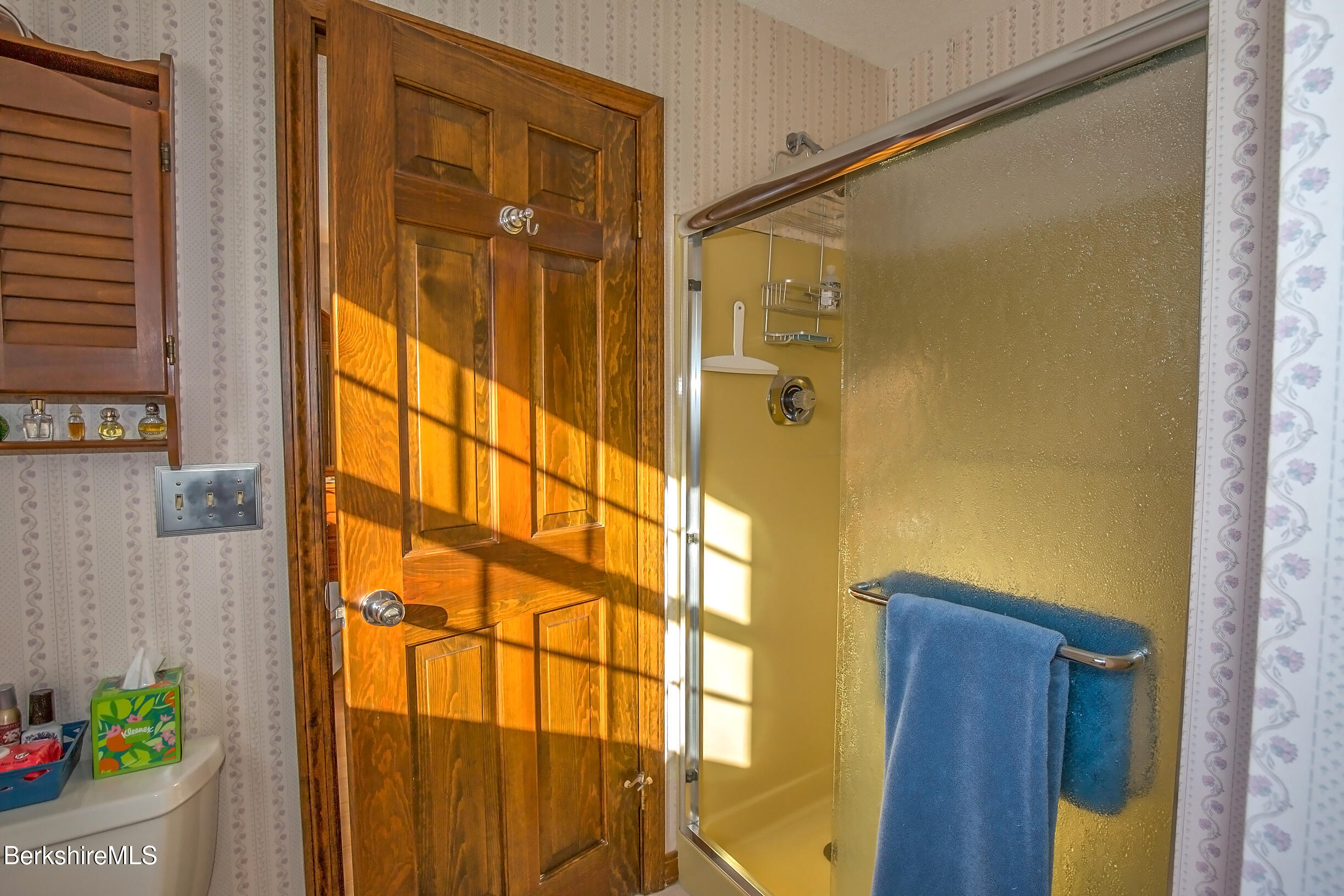 71 King William Road Lenox, MA 01240 - Photo 24 of 43 a bathroom with a glass door shower and a mirror