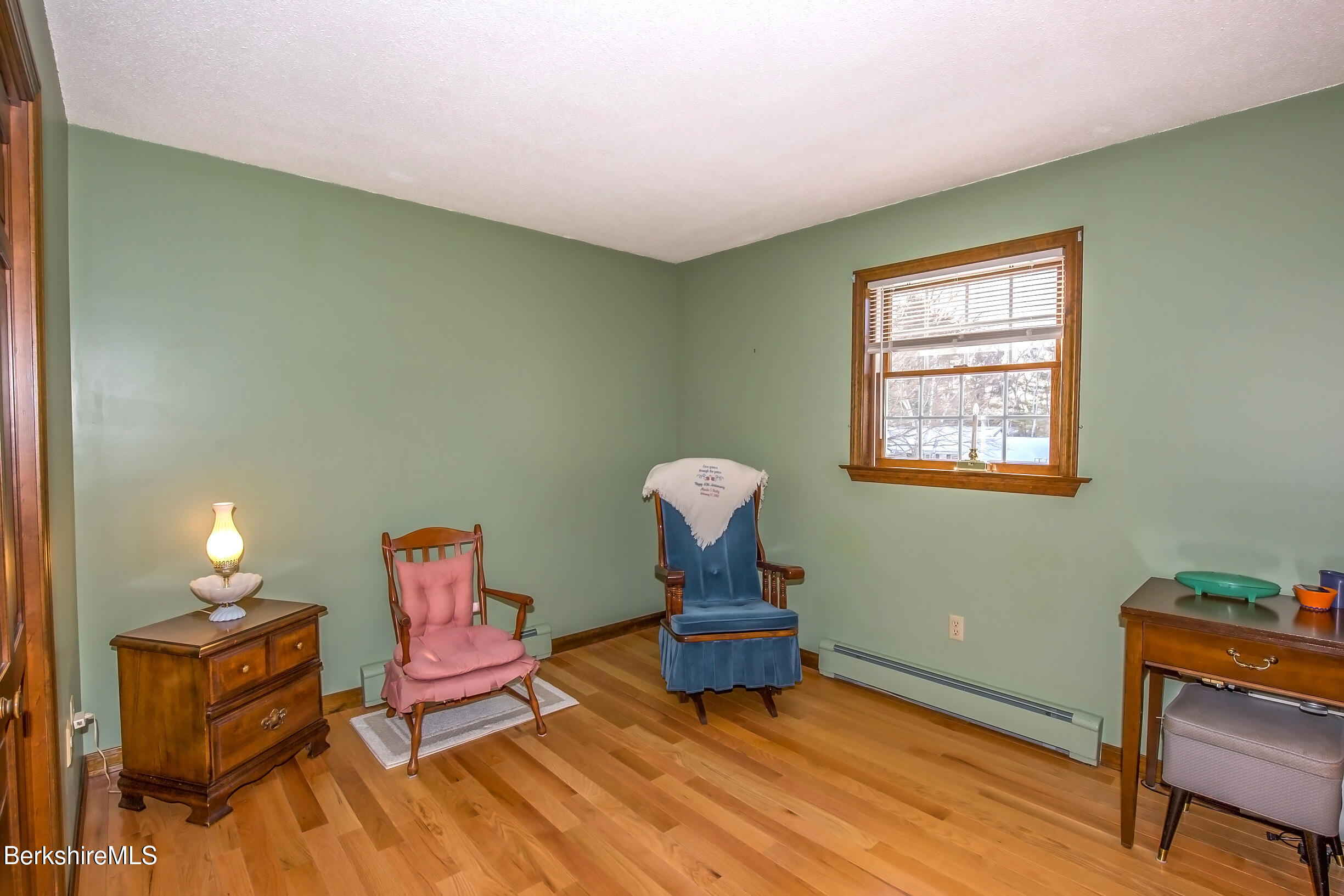 71 King William Road Lenox, MA 01240 - Photo 30 of 43 a room with furniture and a window