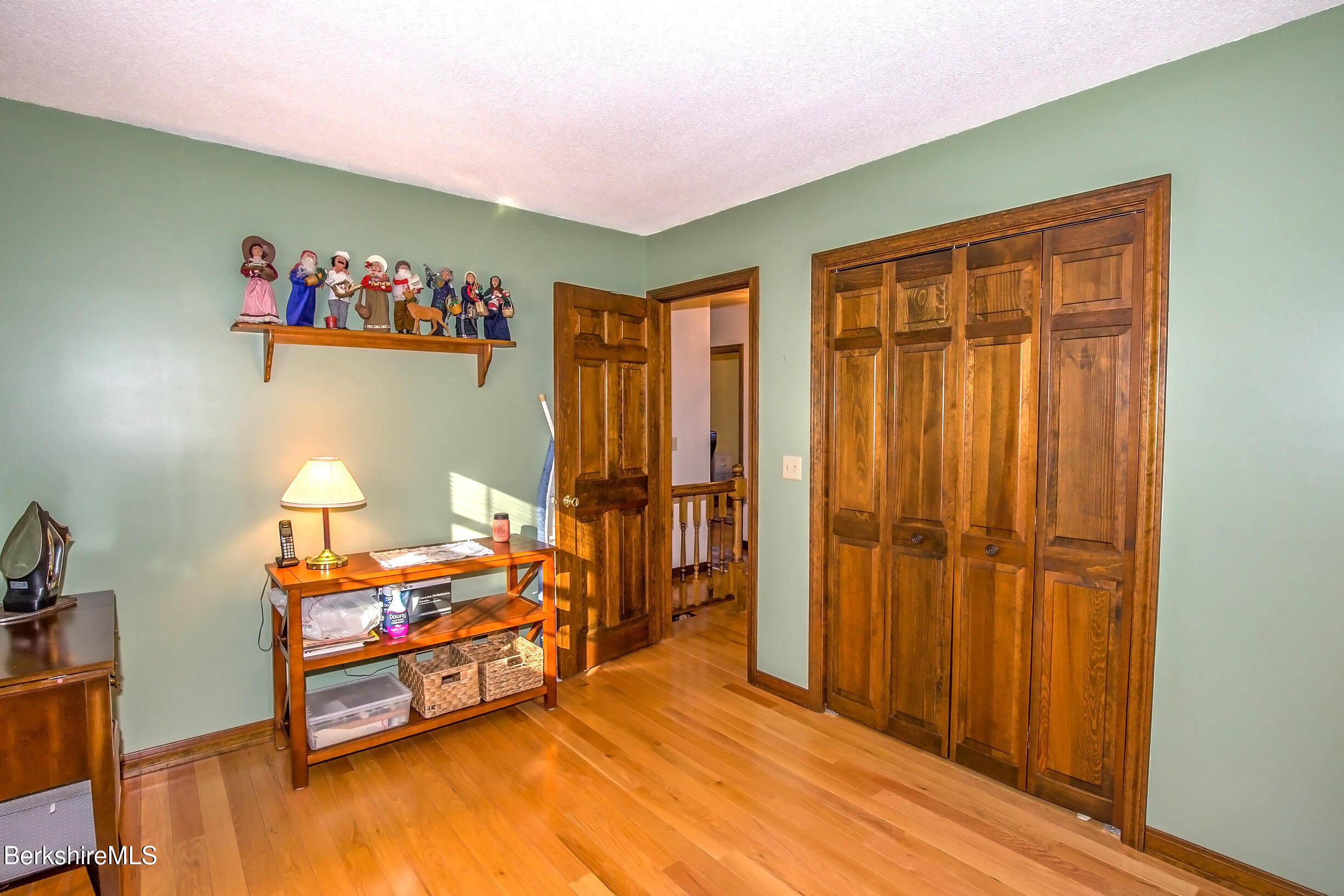 71 King William Road Lenox, MA 01240 - Photo 31 of 43 a room with furniture and a gate