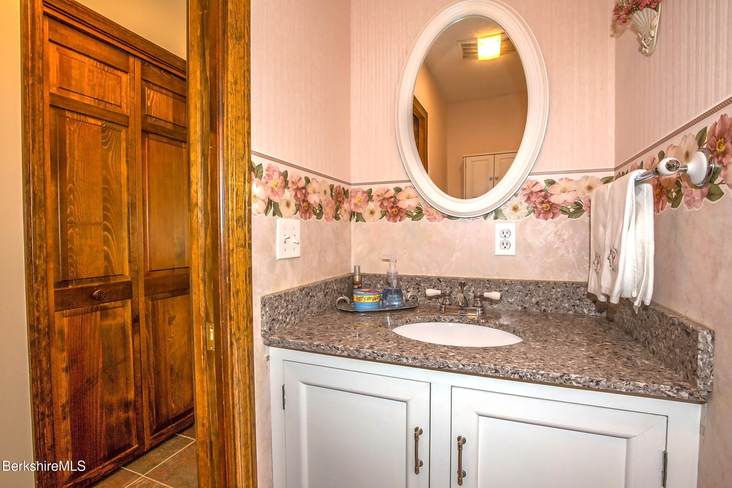 71 King William Road Lenox, MA 01240 - Photo 9 of 43 a bathroom with a granite countertop sink and a mirror