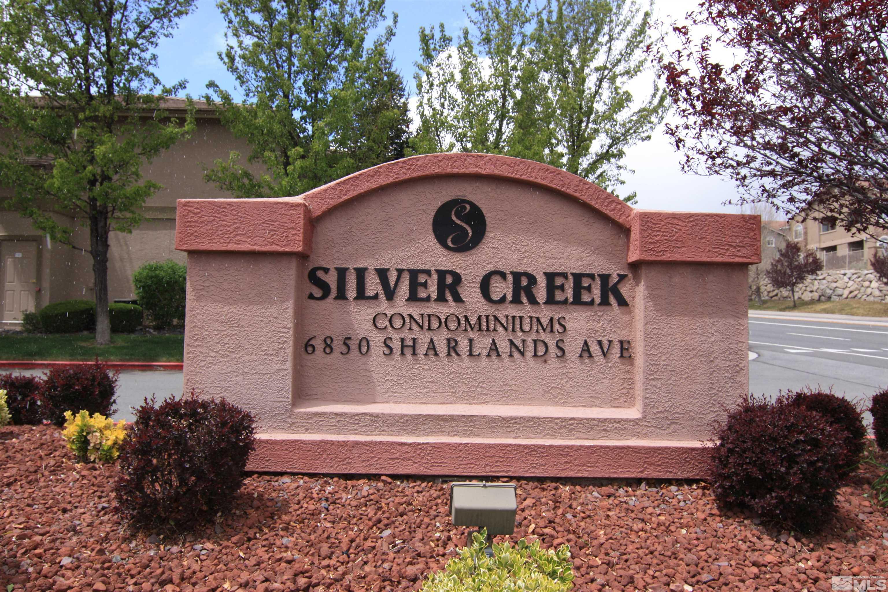 6850 Sharlands Avenue, Unit 1091 Reno, NV 89523 - Photo 1 of 11 a sign on the side of a building