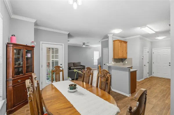 a view of a dining room with furniture