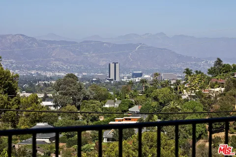 a view of a lake from a balcony