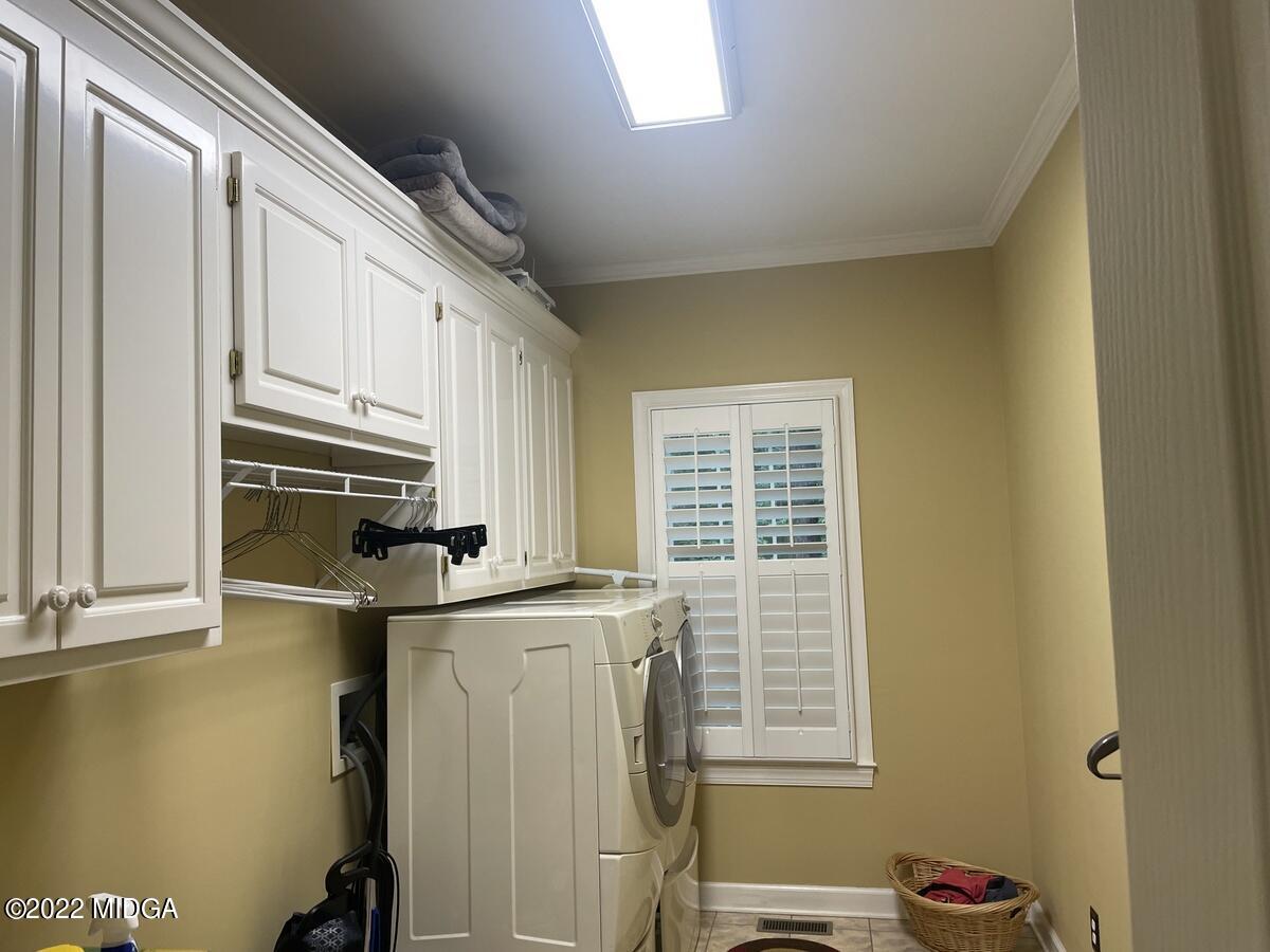 1715 Maynards Mill Road Forsyth, GA 31029 - Photo 13 of 36 a view of kitchen with windows