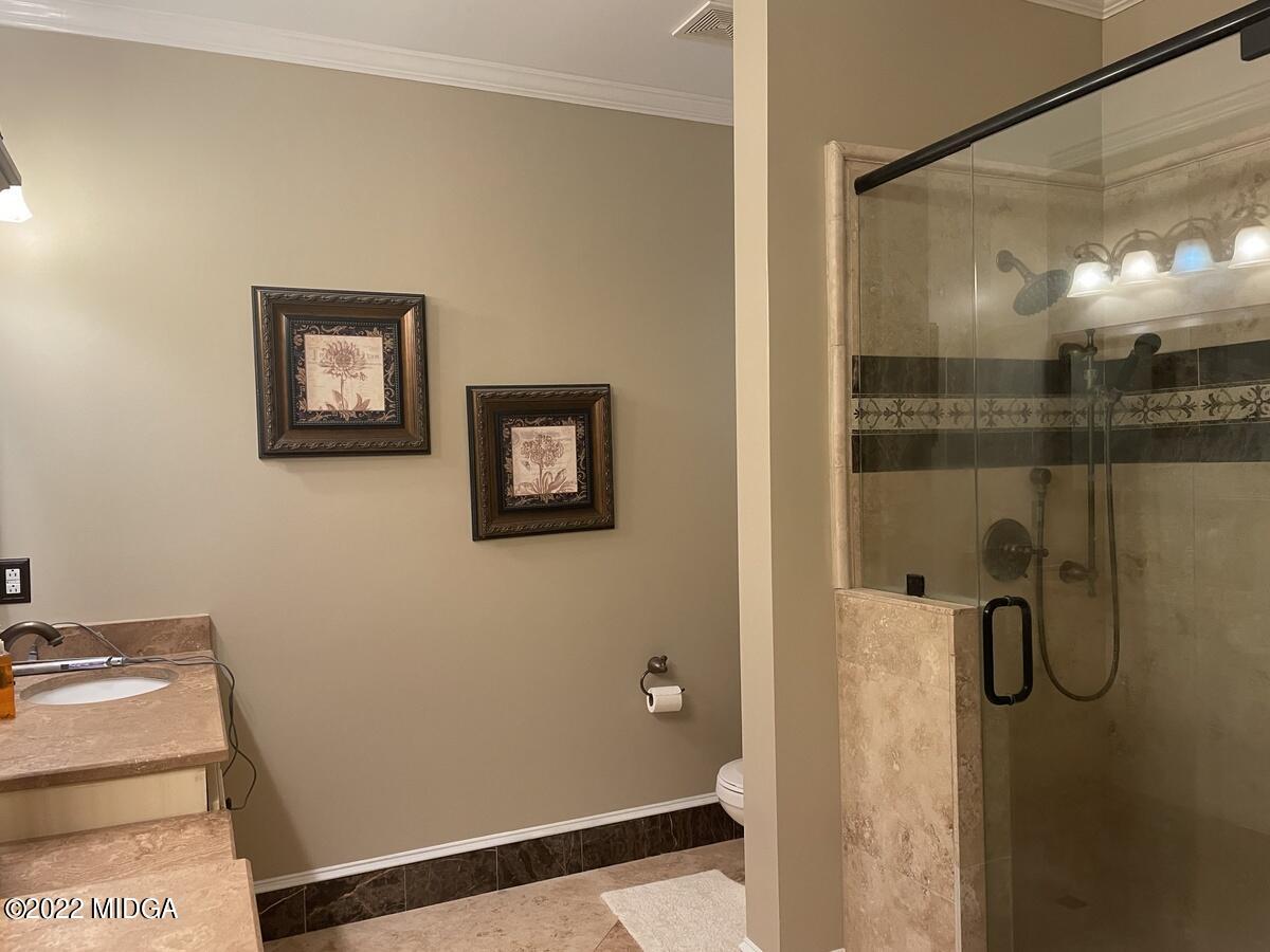 1715 Maynards Mill Road Forsyth, GA 31029 - Photo 27 of 36 a bathroom with a shower