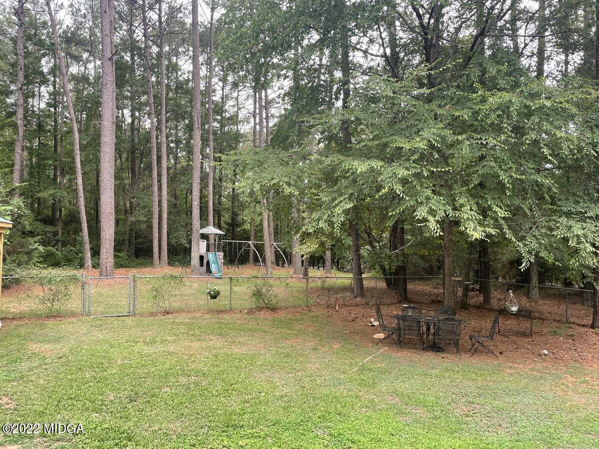 1715 Maynards Mill Road Forsyth, GA 31029 - Photo 32 of 36 a view of a park with plants and trees