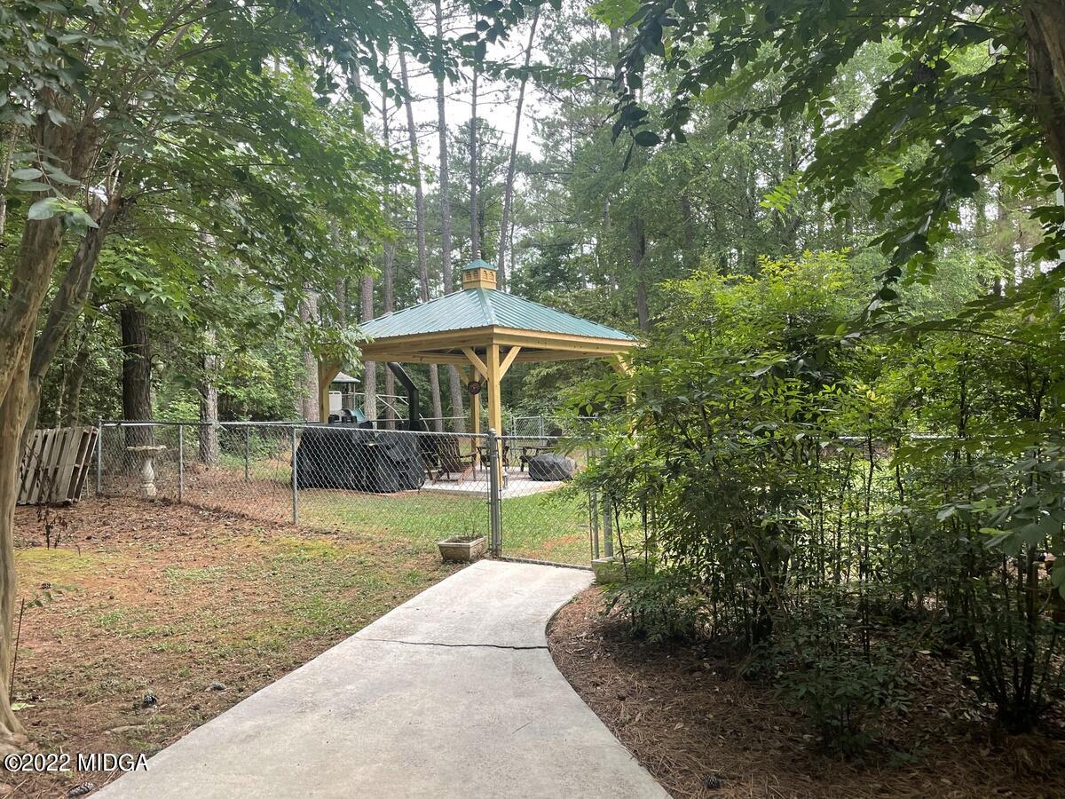 1715 Maynards Mill Road Forsyth, GA 31029 - Photo 34 of 36 a view of backyard with green space