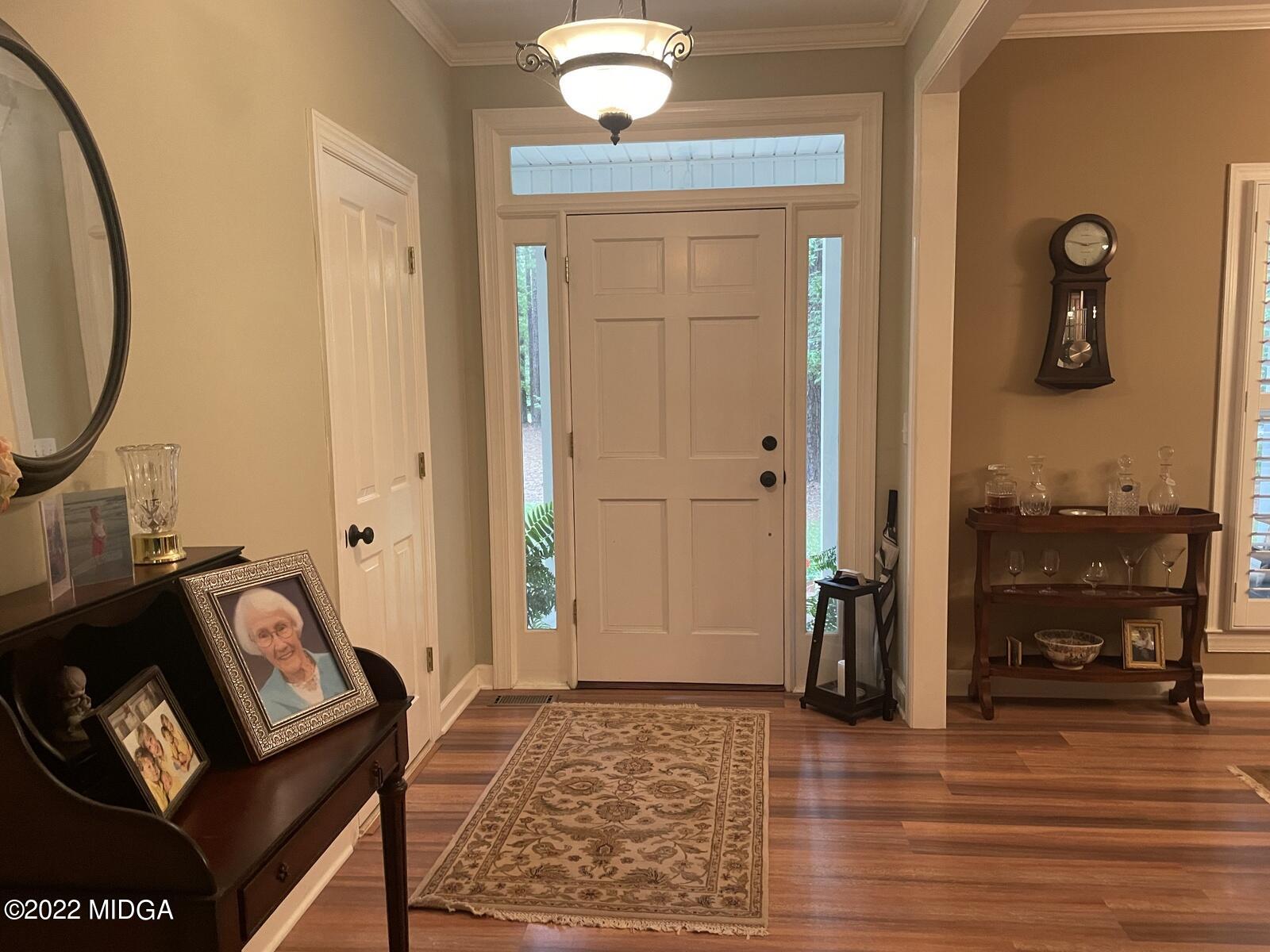 1715 Maynards Mill Road Forsyth, GA 31029 - Photo 5 of 36 a view of an entryway with wooden floor
