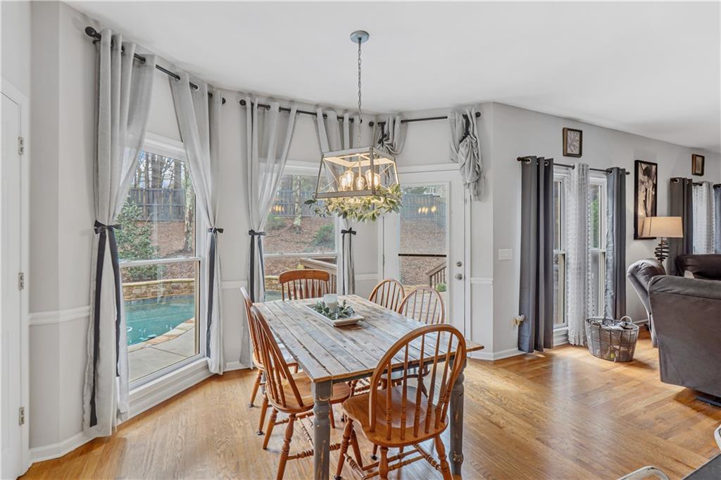 860 Valley Drive Canton, GA 30114 - Photo 20 of 62 a dining room with furniture and window