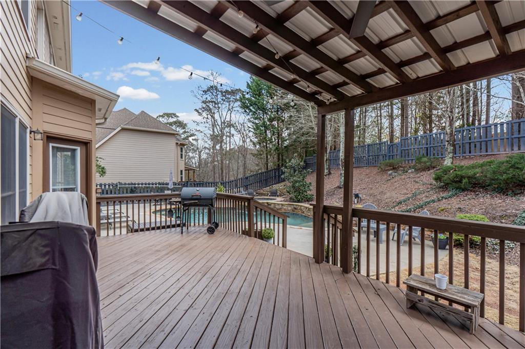 860 Valley Drive Canton, GA 30114 - Photo 45 of 62 a view of a balcony with wooden floor
