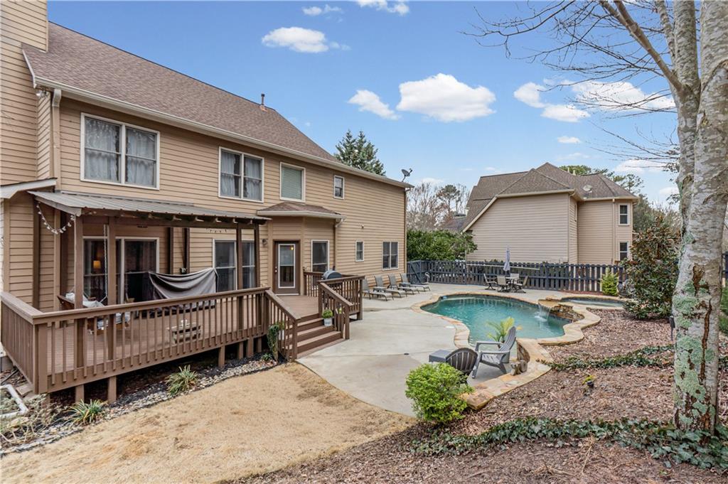 860 Valley Drive Canton, GA 30114 - Photo 49 of 62 a view of a house with swimming pool and sitting area