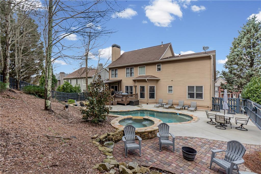 860 Valley Drive Canton, GA 30114 - Photo 51 of 62 a view of a house with backyard and sitting area