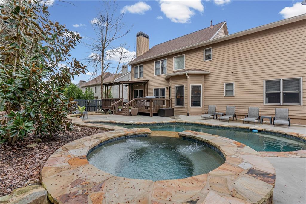 860 Valley Drive Canton, GA 30114 - Photo 55 of 62 a view of a house with swimming pool
