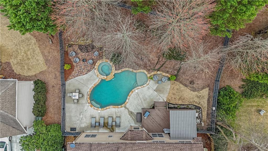 860 Valley Drive Canton, GA 30114 - Photo 56 of 62 an aerial view of a house with outdoor space and a lake view