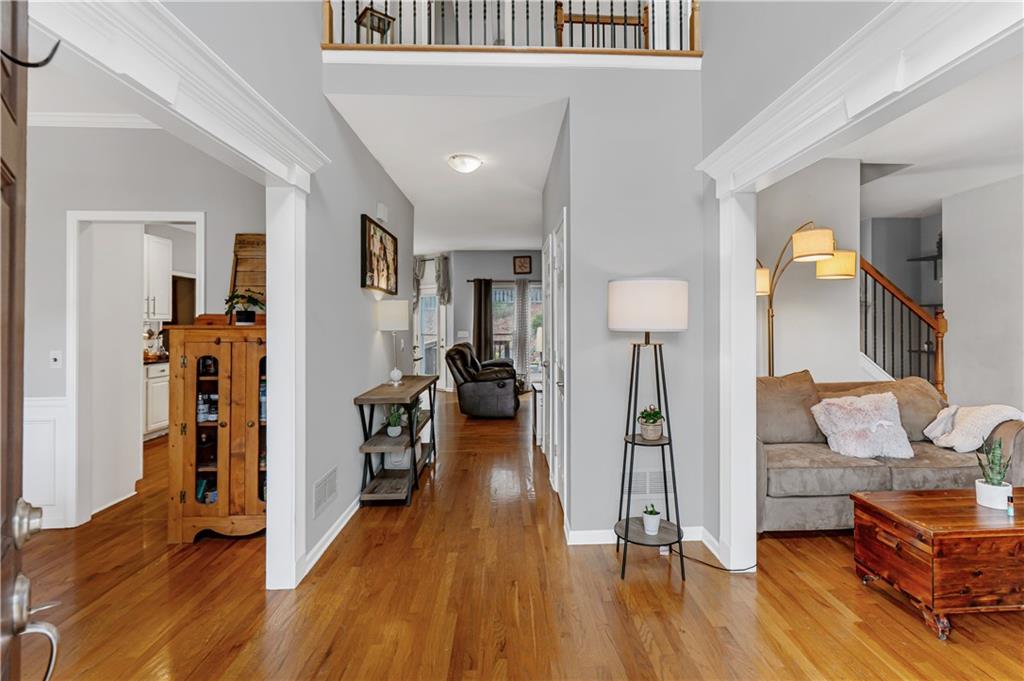 860 Valley Drive Canton, GA 30114 - Photo 6 of 62 a view of a livingroom with furniture and wooden floor