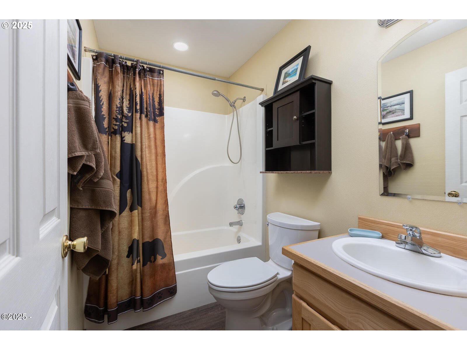 25855 Chinook Street Cloverdale, OR 97112 - Photo 20 of 26 a bathroom with a sink toilet a shower and a mirror