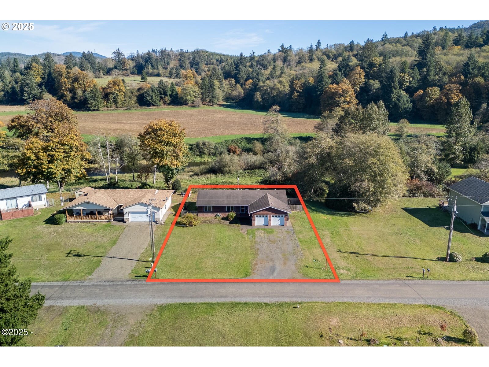 25855 Chinook Street Cloverdale, OR 97112 - Photo 2 of 26 a view of a swimming pool with a yard and mountain view