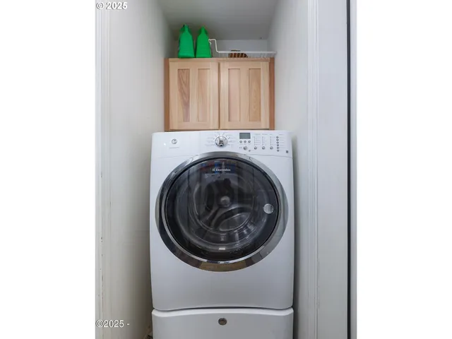 an aerial view of a house with a garden