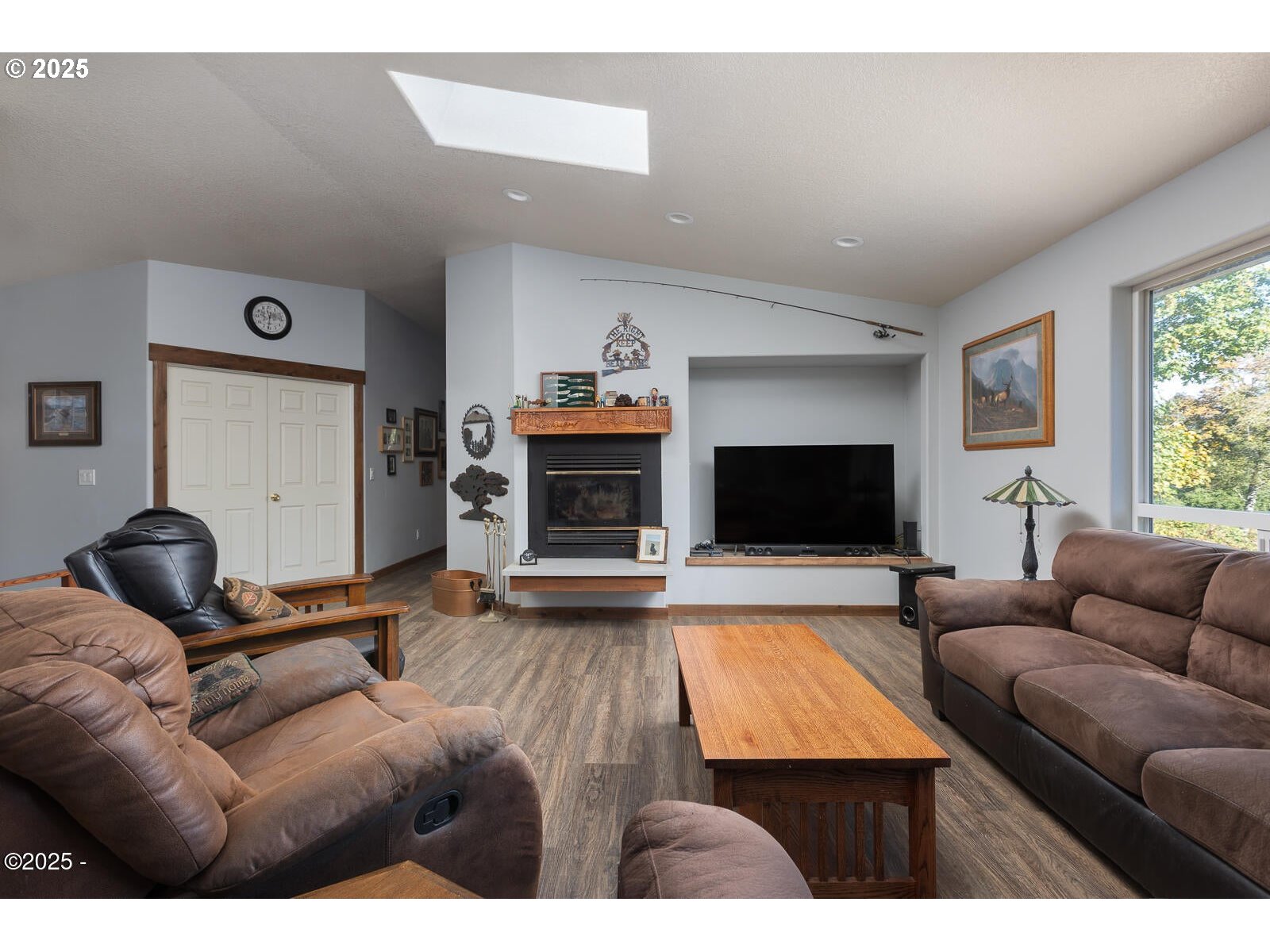 25855 Chinook Street Cloverdale, OR 97112 - Photo 7 of 26 a living room with furniture and a flat screen tv