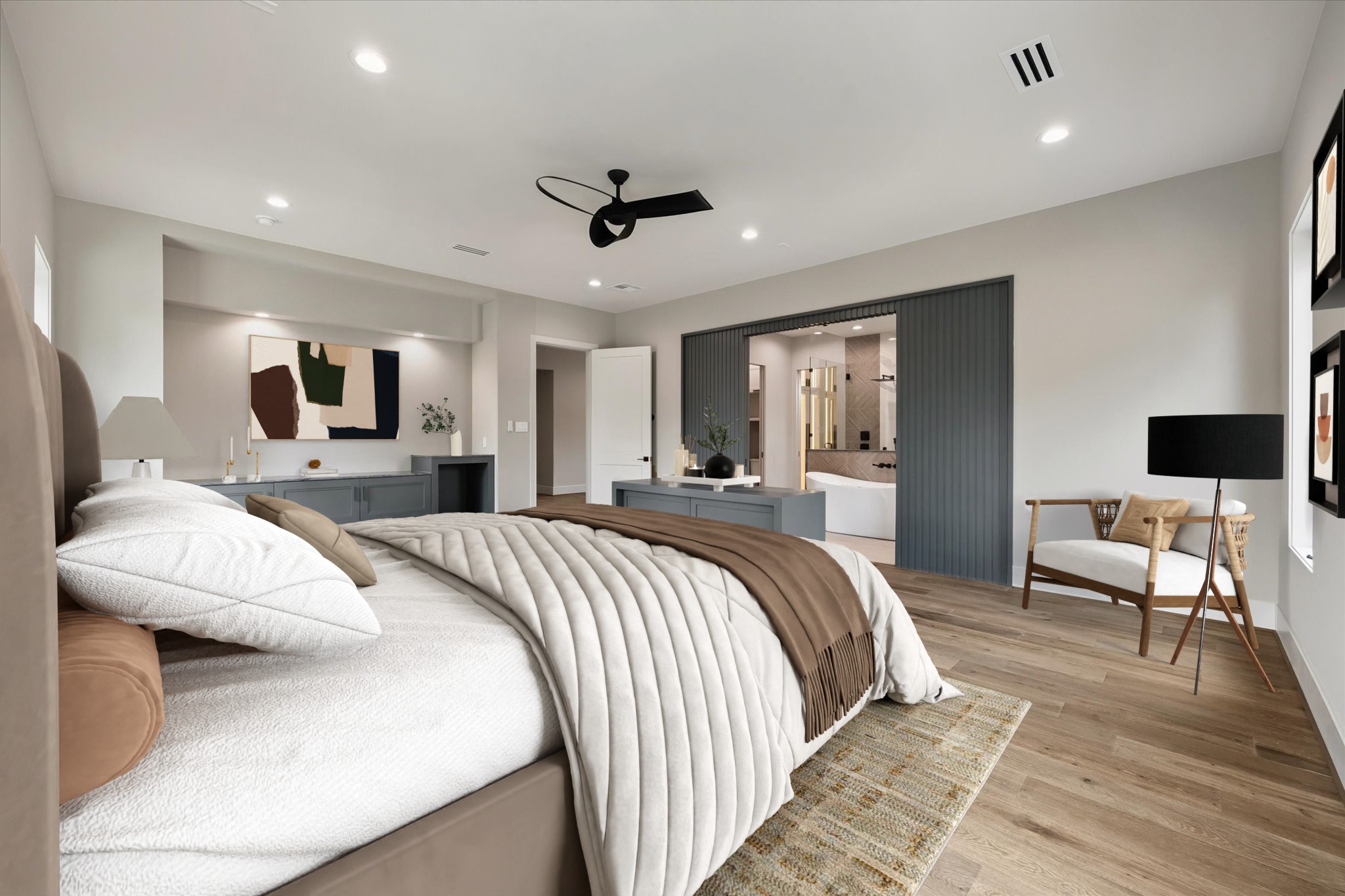 2120 Branard Street Houston, TX 77098 - Photo 16 of 33 The primary bedroom includes a sleek floating cabinet with quartz countertops, adding both style and functionality to the space. Designed with room for a beverage cooler, it creates a convenient refreshment area that enhances the comfort and luxury of the suite.