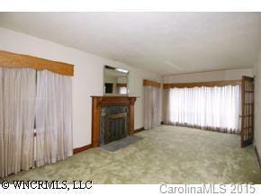 334 Queentown Road Canton, NC 28716 - Photo 3 of 9 a view of an empty room with a window