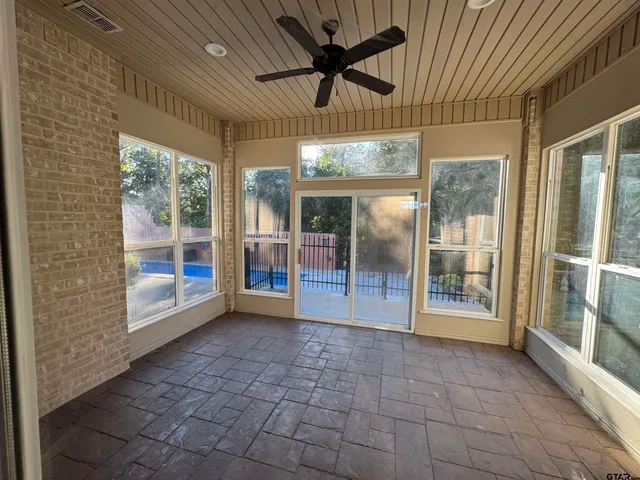 a view of an entryway with a glass door