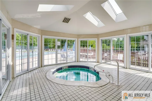 a view of a bedroom with furniture and staircase