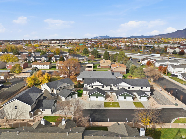 1615 North Angel Street, Unit E Layton, UT 84041 - Photo 34 of 42 Aerial view of residential area with mountains