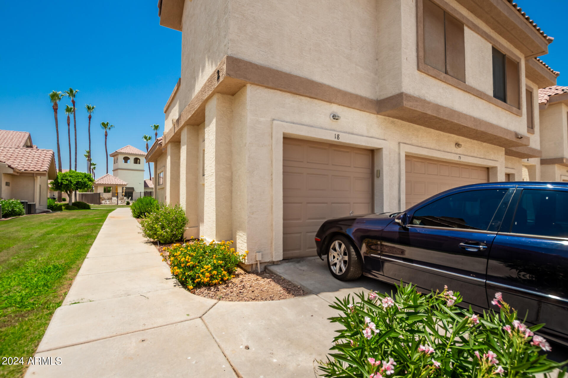 2801 North Litchfield Road, Unit 18 Goodyear, AZ 85395 - Photo 18 of 23 a car parked in front of a house