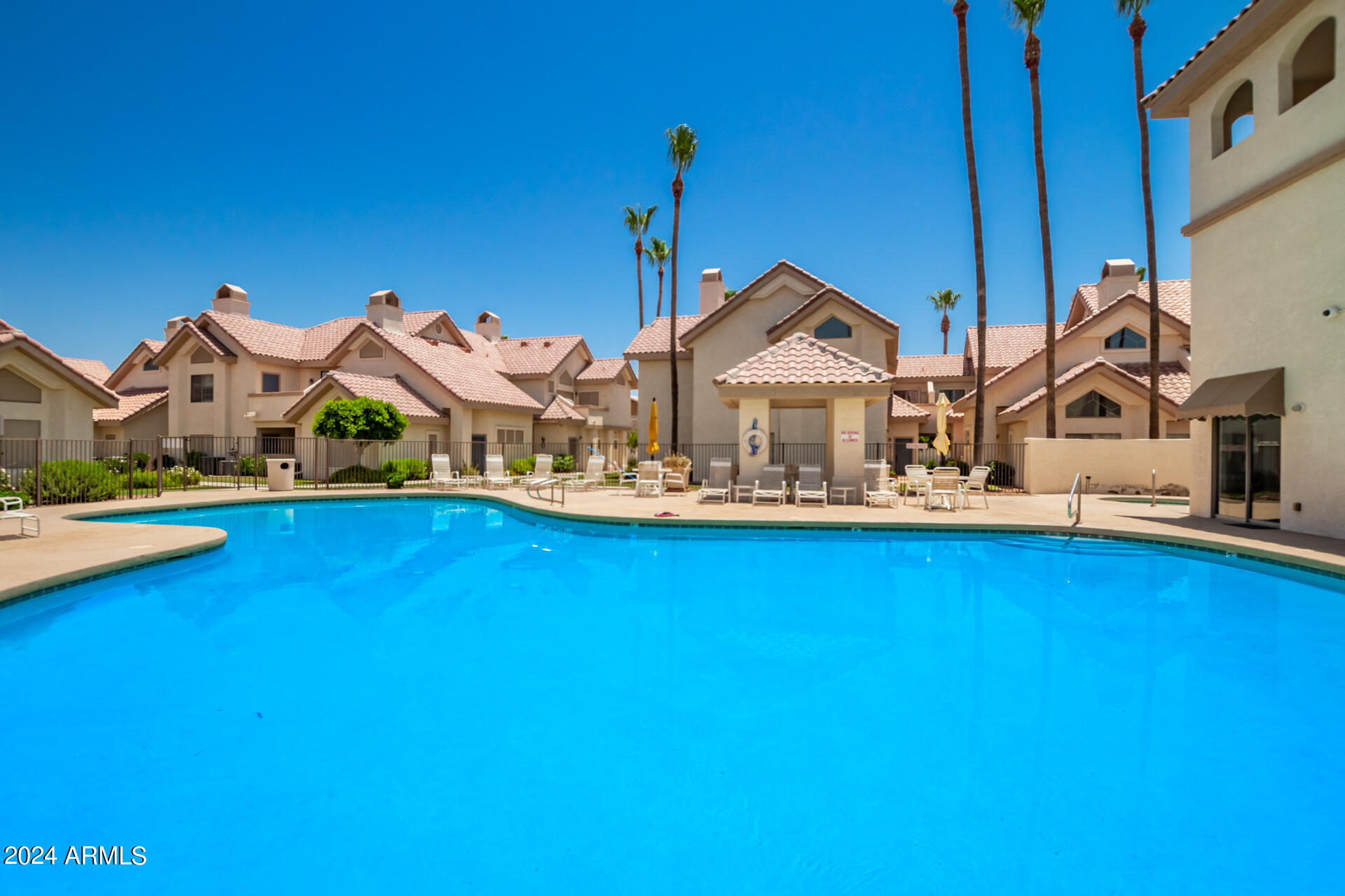 2801 North Litchfield Road, Unit 18 Goodyear, AZ 85395 - Photo 21 of 23 a view of a house with swimming pool