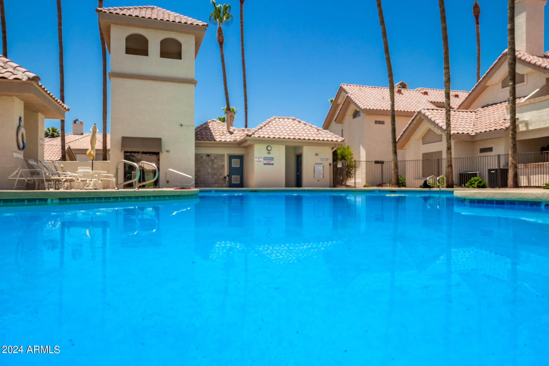 2801 North Litchfield Road, Unit 18 Goodyear, AZ 85395 - Photo 23 of 23 a view of a house with a swimming pool