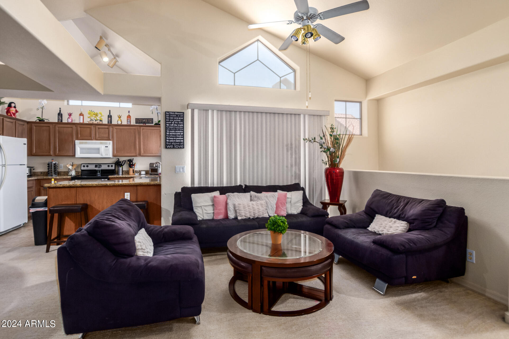 2801 North Litchfield Road, Unit 18 Goodyear, AZ 85395 - Photo 3 of 23 a living room with furniture and a window