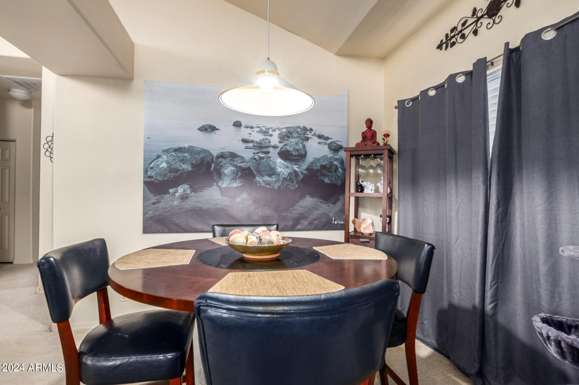 2801 North Litchfield Road, Unit 18 Goodyear, AZ 85395 - Photo 6 of 23 a dining room with furniture and wooden floor