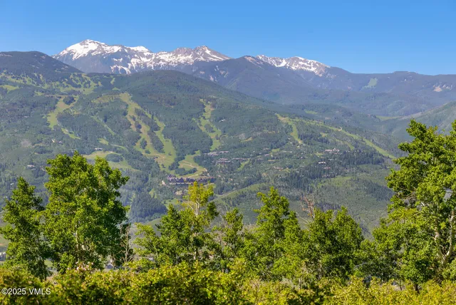 a view of a lake with mountains in the background