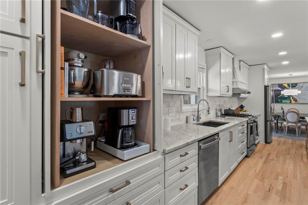 4061 North Cooper Lake Road Southeast Smyrna, GA 30082 - Photo 14 of 45 a kitchen with a sink and cabinets
