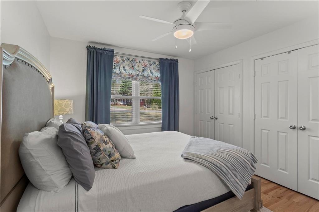 4061 North Cooper Lake Road Southeast Smyrna, GA 30082 - Photo 23 of 45 a bedroom with a bed and a window
