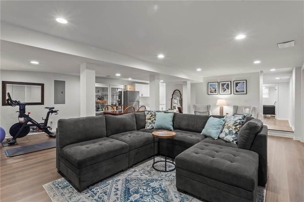 4061 North Cooper Lake Road Southeast Smyrna, GA 30082 - Photo 26 of 45 a living room with furniture and a glass door