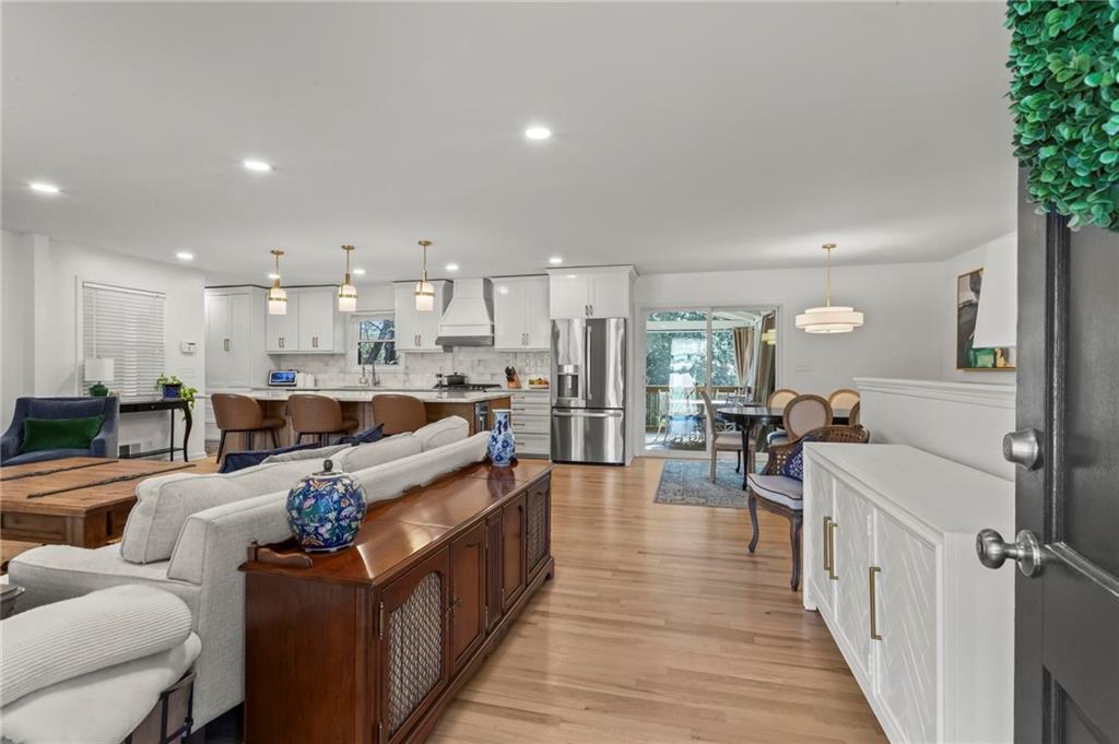 4061 North Cooper Lake Road Southeast Smyrna, GA 30082 - Photo 3 of 45 a living room with furniture and a wooden floor