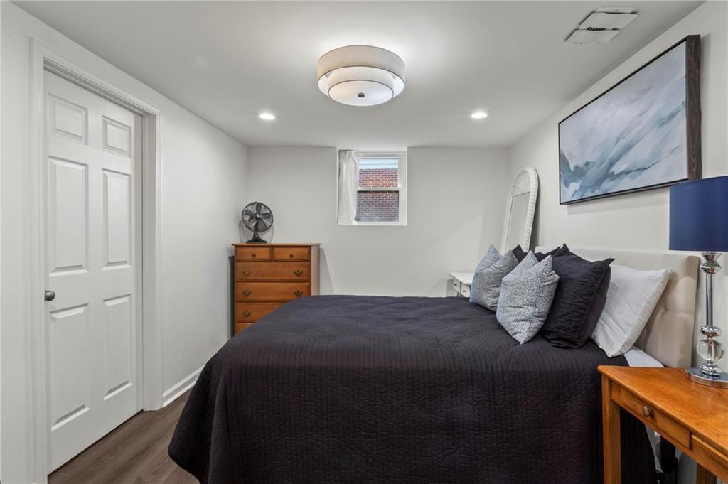 4061 North Cooper Lake Road Southeast Smyrna, GA 30082 - Photo 31 of 45 a bedroom with a bed and furniture