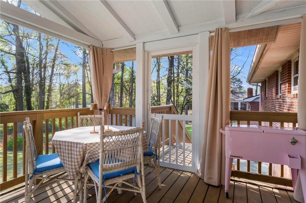 4061 North Cooper Lake Road Southeast Smyrna, GA 30082 - Photo 37 of 45 a view of a dining room with furniture window and outside view