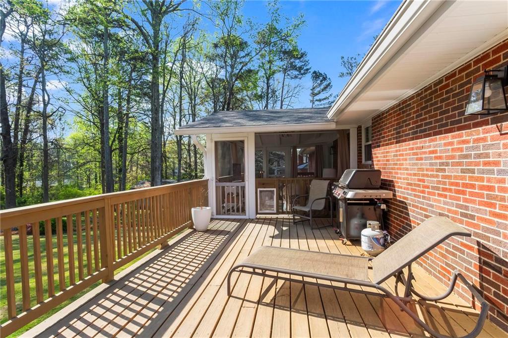 4061 North Cooper Lake Road Southeast Smyrna, GA 30082 - Photo 38 of 45 a view of a chair and tables in the balcony
